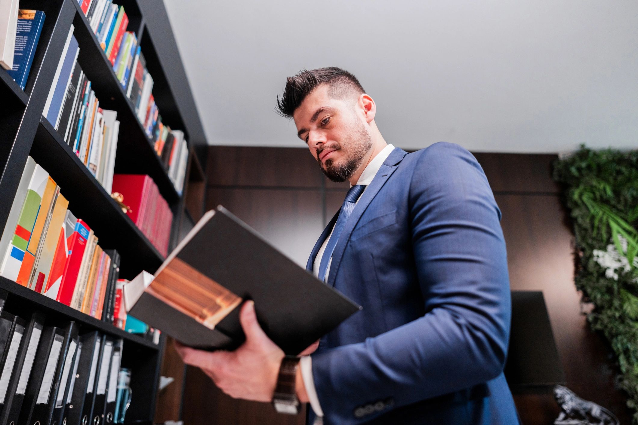 Attorney reviewing case materials in an office